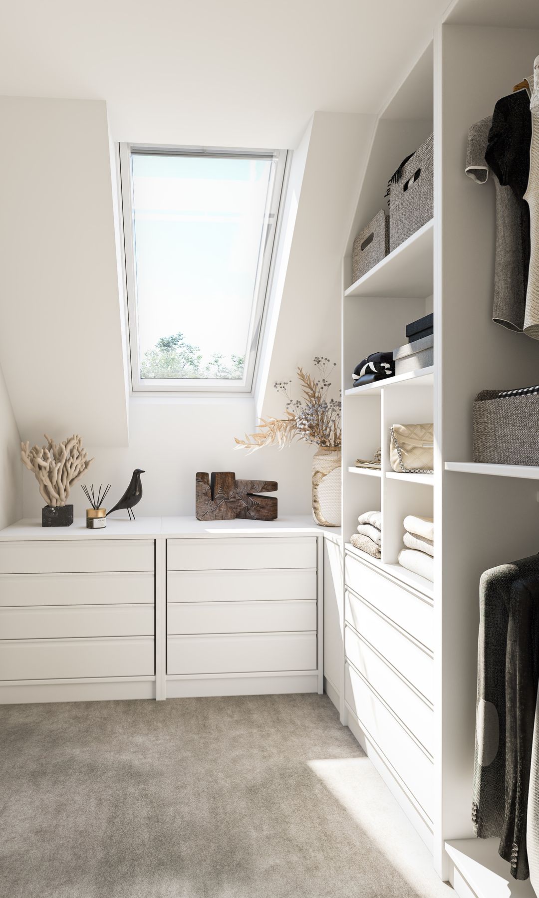 Vestidor abuhardillado con ventana de techo Velux, cajonera y estructura blancas
